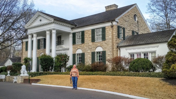 Charlene in front of mansion